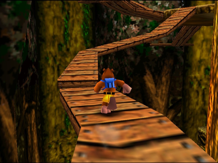 Banjo the bear running along a winding wooden walkway suspended in the air.